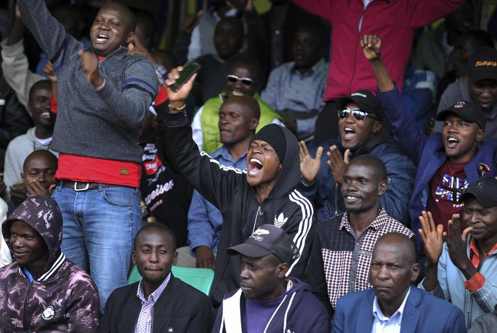 Kenyans celebrate Eliud Kipchoge's sub-2 hour marathon time